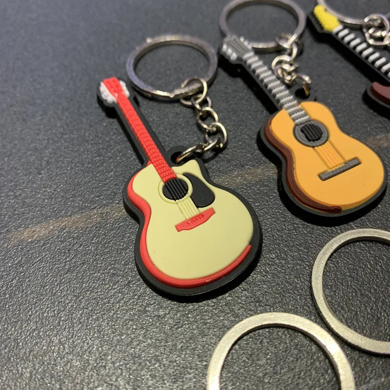 Chaveiro de instrumentos musicais em miniatura, de silicone, diversos modelos