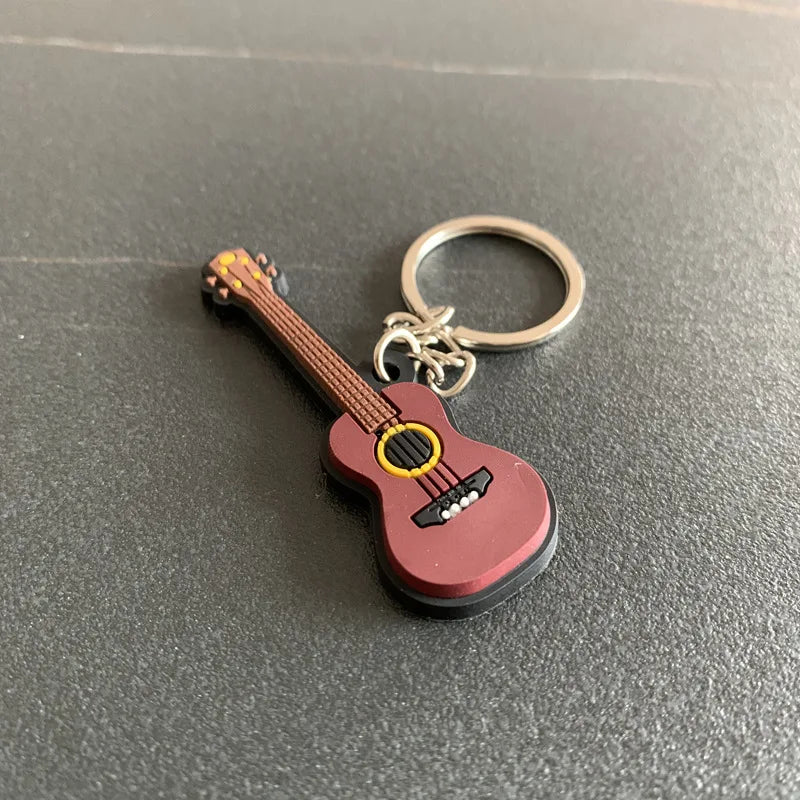 Chaveiro de instrumentos musicais em miniatura, de silicone, diversos modelos